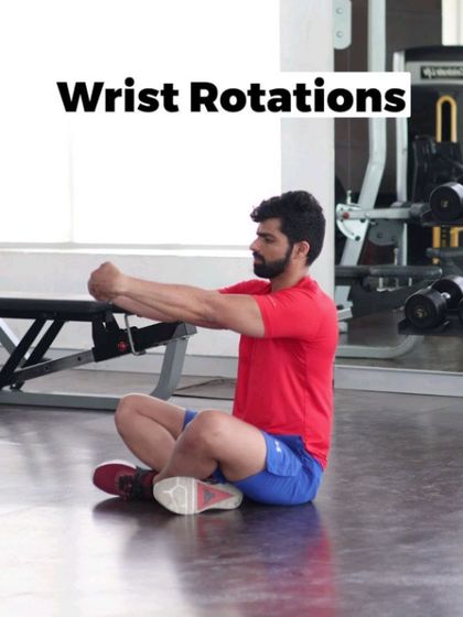 Wrist rotations are a simple yet effective way to warm up your joints before any upper body workout.