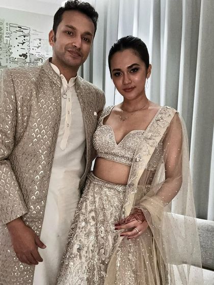 Another stunning couple in our champagne gold collection. This look is all about regal elegance, perfect for making a statement at any grand event.