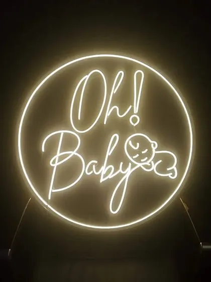 Add a personal glow to your event with a custom neon sign. This 'Oh! Baby' sign is a popular choice, and I can create custom designs in various fonts and shapes to match your theme perfectly.