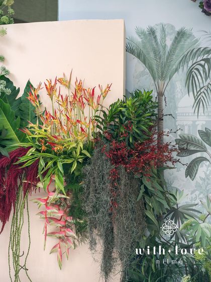 A detail of the tropical foliage and flowers from the 'Garden of Gaia' design.