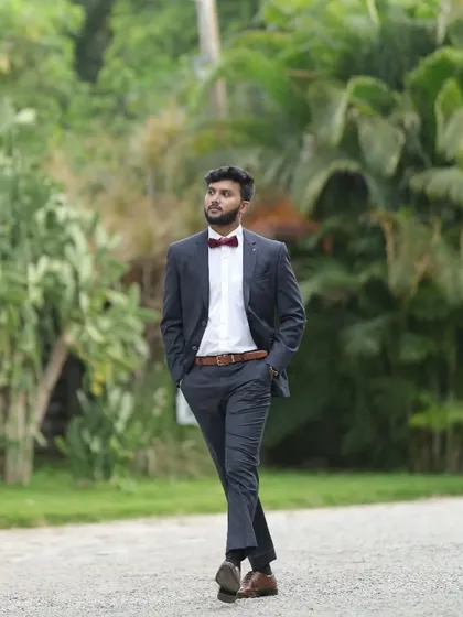 A professional and polished presentation is just as important as the magic itself. I believe in looking the part for every corporate event, whether it's a formal awards night or a casual team gathering. This is the sharp, approachable style I bring to your event.