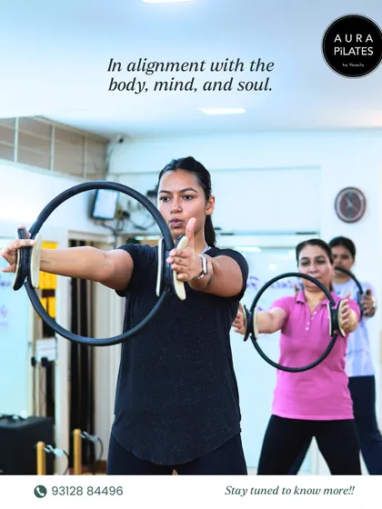 This image captures the essence of a group class using the magic circle. My goal is to bring everyone into alignment, not just with their own body, mind, and soul, but with each other.