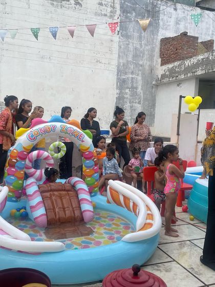 This inflatable pool with a candy-themed slide is a huge hit with the younger children. It provides hours of safe and fun water play.