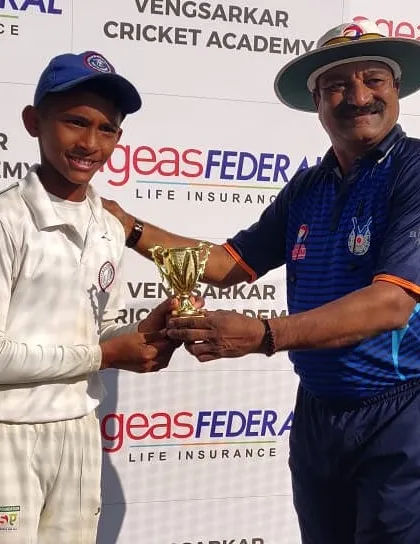 Yash Jadhav receiving his award after scoring a crucial 63 runs in the semi-final of the IDBI U-13 Cup. He performs when it matters most.