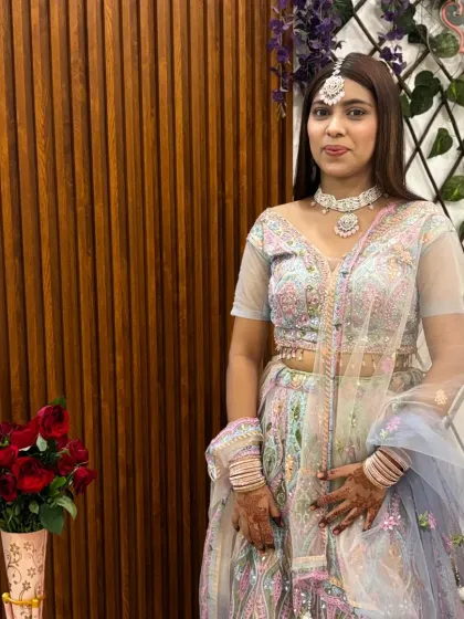 A closer look at this stunning multi-color lehenga. The intricate embroidery and pastel shades make it a perfect outfit for a modern bride or bridesmaid.