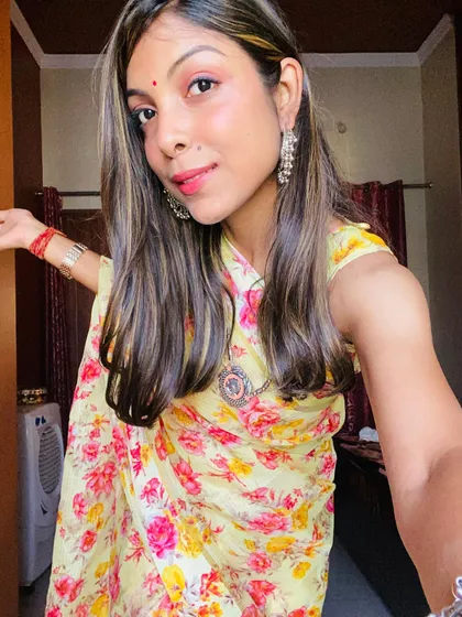 A saree is always a good idea. Here I am in a bright and cheerful yellow floral saree, perfect for a daytime event or a casual outing. I believe in finding sarees that are easy to wear and make you feel happy.