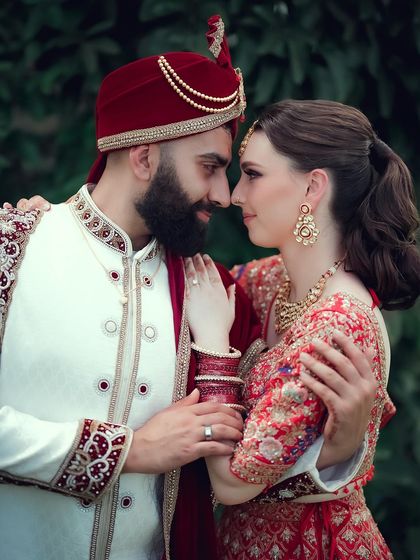 An intimate close-up of a multicultural couple, their faces close together, capturing the deep love and connection between them.