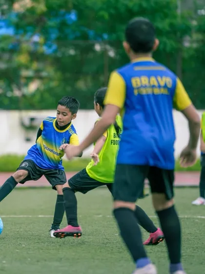 Home is where the field is. Players engaged in a small-sided game to improve their decision-making.