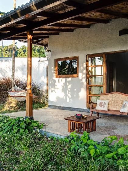 Another view of a Garden Suite's private veranda, a perfect example of the indoor-outdoor living that defines my architectural style.