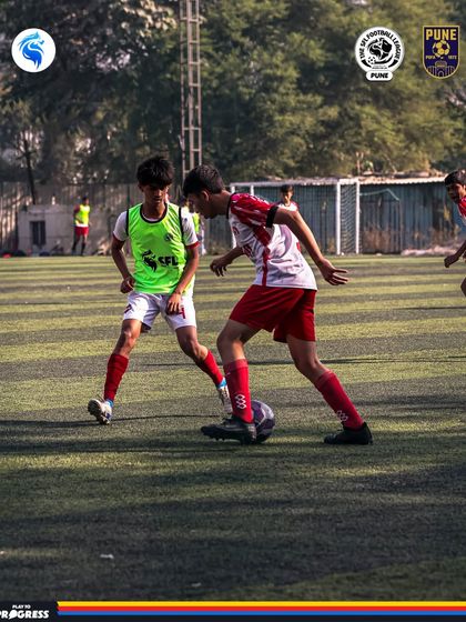 A skillful turn from a player to get away from his marker during a competitive match in Pune.