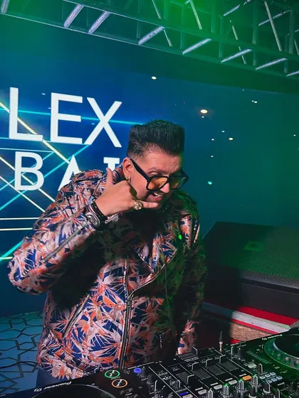 A fun, candid shot of me at the console, signaling to the crowd. It's all about interaction and creating a shared experience.