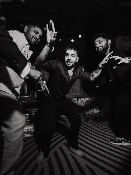 The after-party madness! Capturing the groomsmen and friends letting loose on the dance floor.