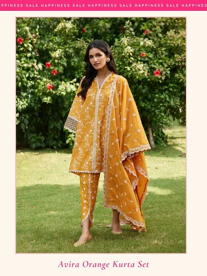 The Avira Orange Kurta Set is perfect for when you want to make a statement. The bright color, dhoti-style pants, and lace details are sure to turn heads.