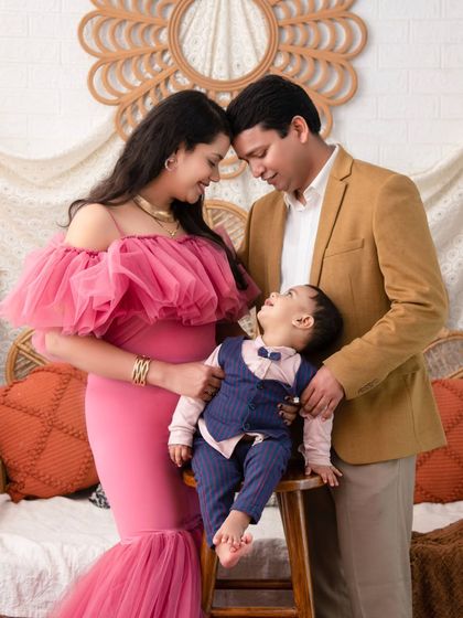 A beautiful family moment, with the little one looking up at his parents with pure adoration. These are the fleeting moments I love to preserve.