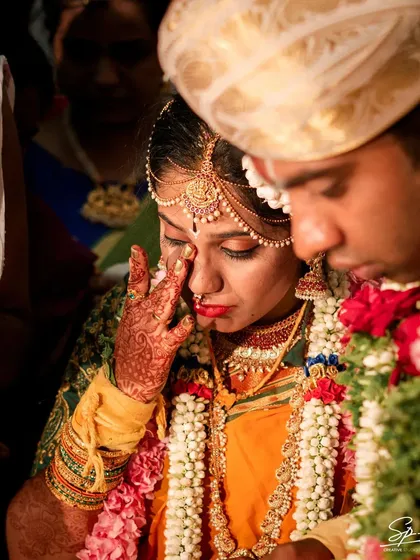 Weddings are full of powerful emotions, and we are there to capture them all. This poignant moment of a bride's happy tears is a testament to the deep, unscripted feelings that make a wedding day so meaningful.