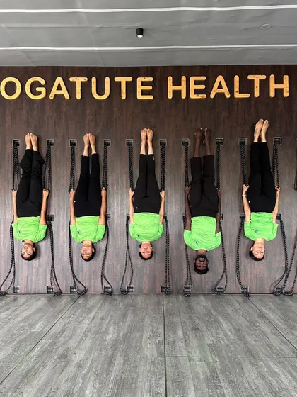 Our teacher trainees practicing a synchronized inversion on the rope wall. This builds a sense of community and discipline while offering all the benefits of spinal decompression and improved circulation.