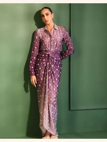 A full view of the Husna Purple Skirt Set. The draped skirt is so flattering and the ombre print is unique. A great choice for a cocktail or sangeet night.