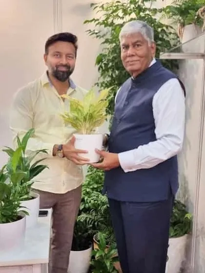 A proud moment as Shri Vijay Kalantari, Chairman of the World Trade Centre Mumbai, honored my stall with his visit at the MSME Startup Expo. I am gifting him a beautiful Aglaonema plant.