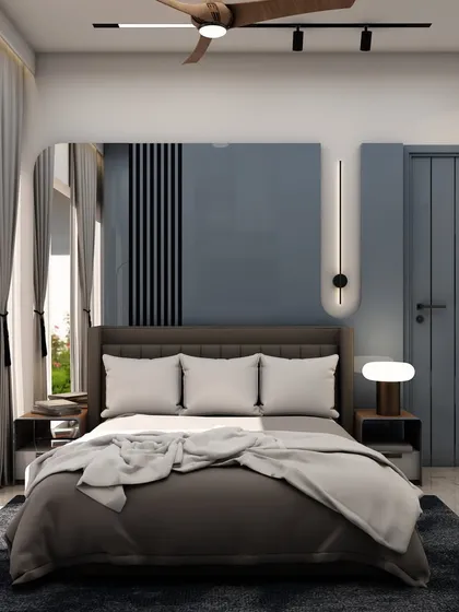 A full view of the slate-blue bedroom, highlighting the large window that lets in ample natural light and the cohesive color scheme that creates a calming environment.