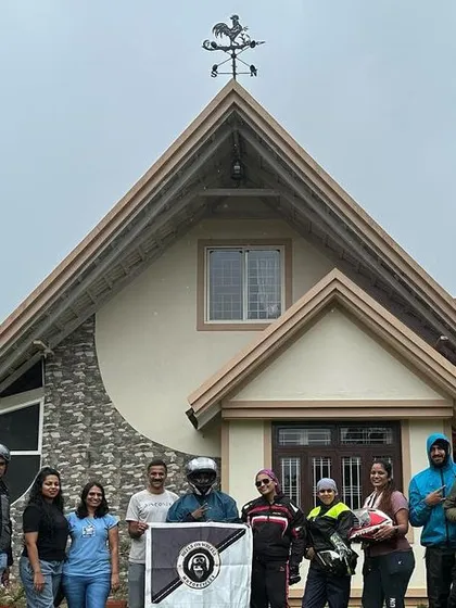 The group posing in front of our homestay in Sakleshpura. Our weekend trips are a perfect getaway.