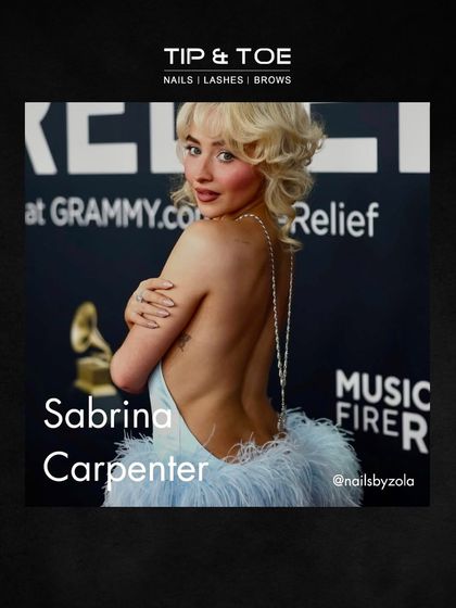 Sabrina Carpenter's nails at the Grammys show a softer side of glam. This subtle, shimmery look is both elegant and on-trend.