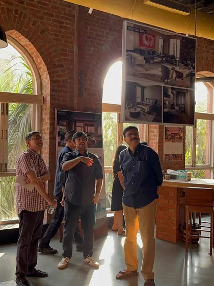 Visitors looking at our project boards during the KGAF exhibition at The Loft.