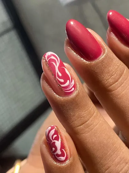 What's your go-to color? This magenta set with white swirl art is a statement.