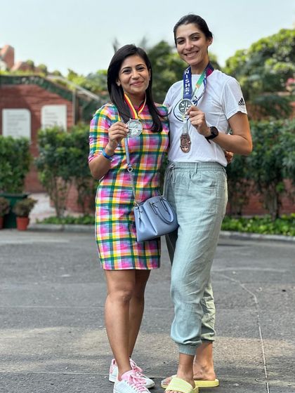 Celebrating with a friend who also completed a World Major Marathon. We share a bond forged through miles of training and the pursuit of big goals.