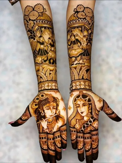 For a touch of divine love, I can create beautiful portraits like these of Radha and Krishna. This design is perfect for brides who want to incorporate spiritual and artistic elements into their mehendi.