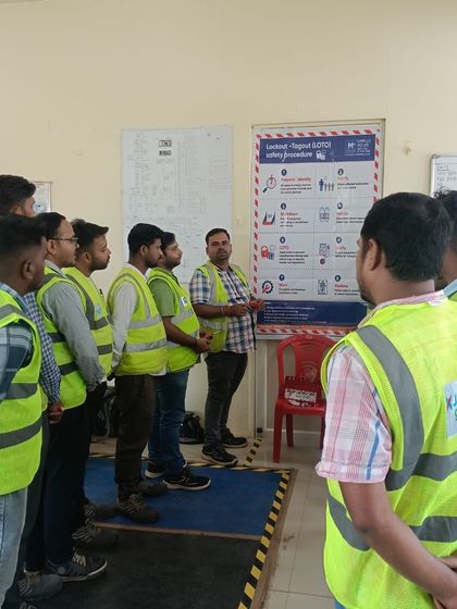 A technician receives hands-on training on Lockout-Tagout (LOTO) procedures. These regular training modules are essential for ensuring the protection and well-being of our employees during maintenance activities.