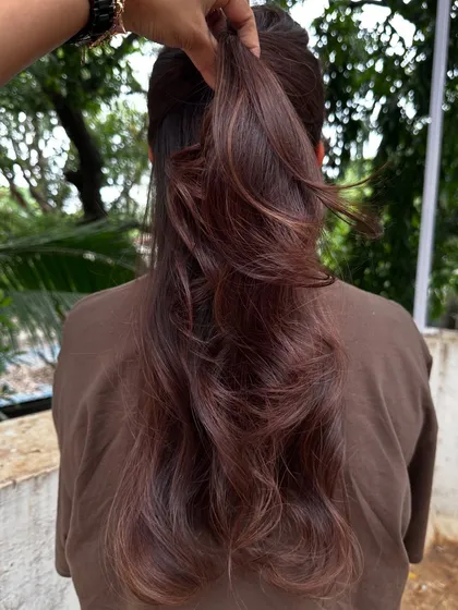 A classic 'Chestnut Brown'. This is a timeless and elegant color that suits so many skin tones. It’s rich, warm, and full of shine.