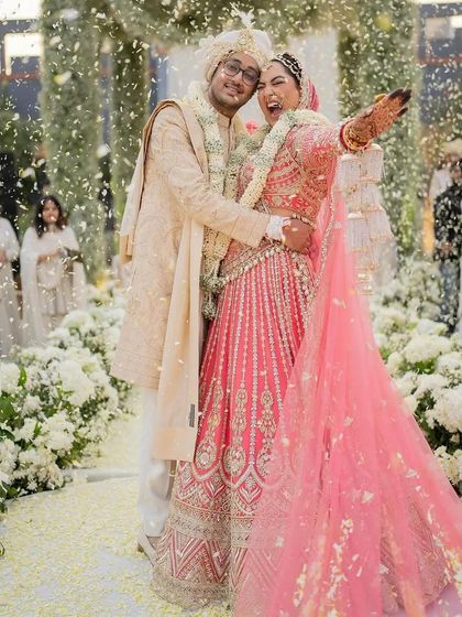 Pure, unadulterated joy. The smiles, the laughter, the shower of petals. This is why I do what I do.