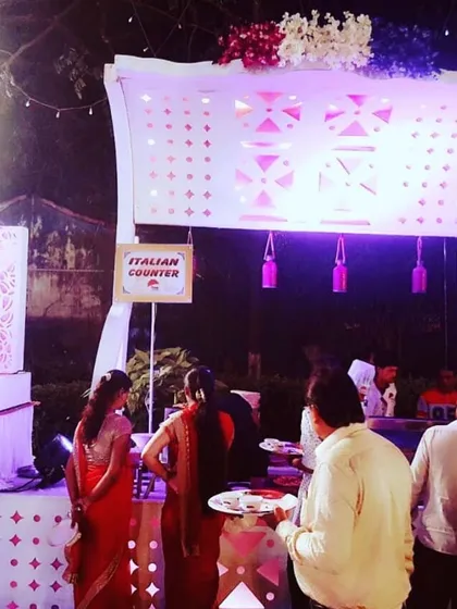 An example of our dedicated Italian counter at an outdoor event. We create specific zones for different cuisines to help guests navigate the menu and enjoy a world of flavors.