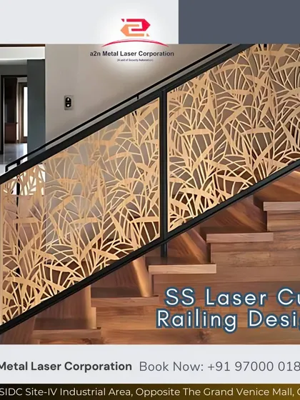 A stunning stainless steel laser-cut railing with a delicate, leaf-like pattern, installed on a modern wooden staircase. This demonstrates how we integrate functional safety elements with artistic design for a sophisticated interior.