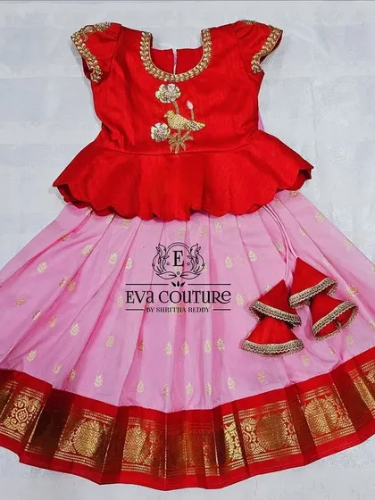For the tiniest members of the family, I offer ready-to-ship newborn Pattu Pavadai sets. This classic red and pink combination is crafted from soft fabric and includes extra margins to be wearable for up to 2.5 years.