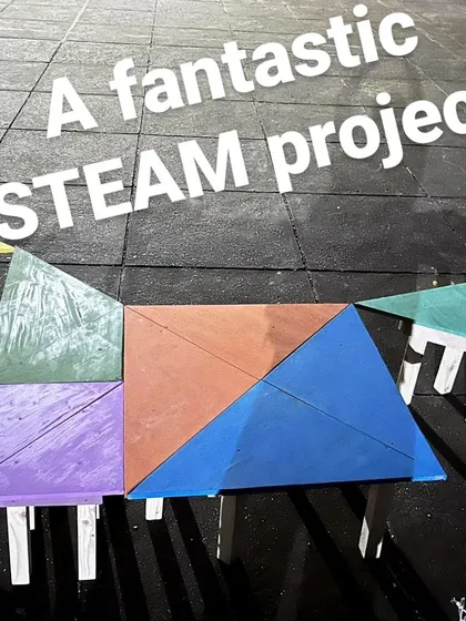 The finished Tangram Table, a fantastic STEAM project created by students. Each team built a different geometric piece that fits together to form a whole.