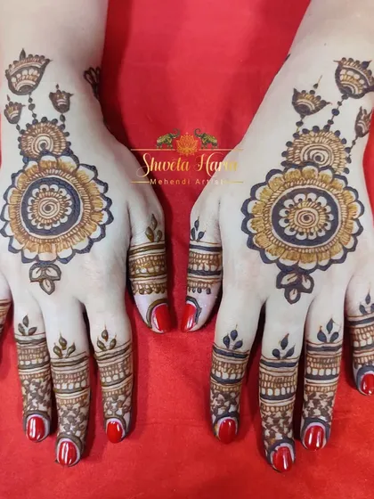 Another view of a beautiful mandala design. The symmetry and intricate details of the central flower, paired with the decorative finger patterns, make this a stunning choice.