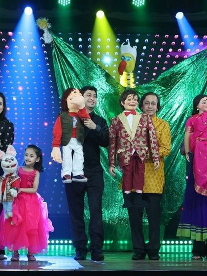 The Padhye family and our team of puppeteers on stage. This show was a celebration of our family's century-long journey in the art of puppetry.