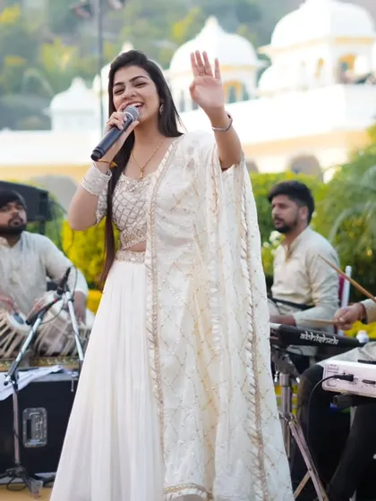 This is my happy place, on stage with my incredible band. We believe in the magic of 100% live music, with tabla, keyboard, and dholak creating a sound that connects directly with the heart. This was during a beautiful Haldi ceremony in Udaipur.