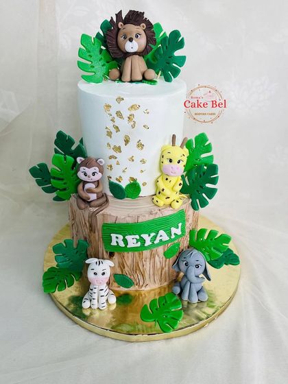 Another view of the elegant two-tier jungle cake for Reyan.