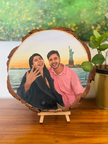 This happy couple's engagement photo was transformed into a beautiful keepsake on a wood slice, with the Statue of Liberty in the background.