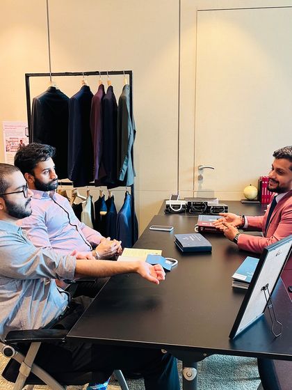 A group consultation at the Khaitan trunk show. We often engage with small teams, fostering a collaborative environment where colleagues can discuss style and learn about the benefits of bespoke tailoring together.