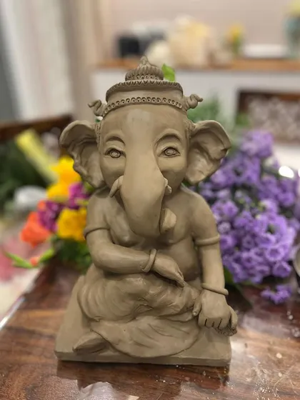 Bappa alley. My handmade Ganesha finally at home, surrounded by flowers and love.