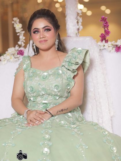 A princess moment for this engagement bride in her mint green gown. The makeup is dewy and glossy to match the fairytale vibe.