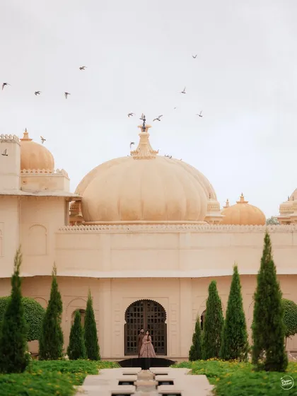 A majestic pre-wedding shoot at The Oberoi Udaivilas. Capturing a couple against such a grand, palatial backdrop feels like creating a modern fairytale, showing the scale of love and celebration.