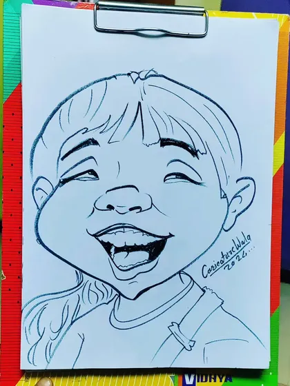A caricature of a happy, laughing child. I love capturing these joyful and energetic expressions.