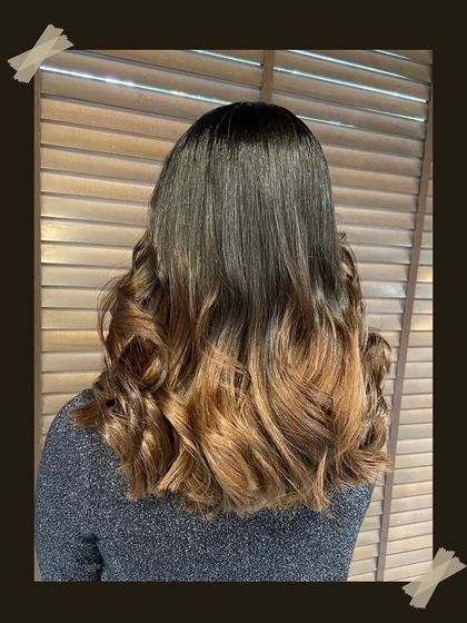 Another shot of this flawless balayage, emphasizing the shine and healthy texture of the hair after our professional color and styling service.