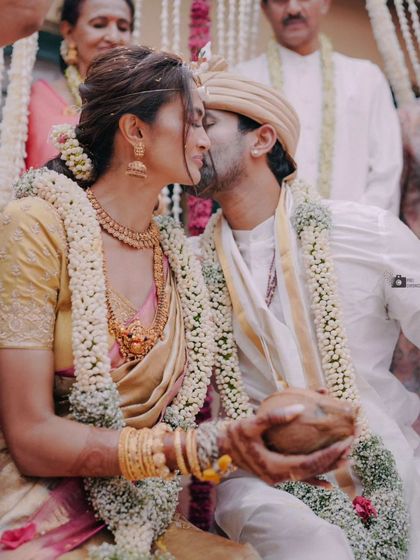 A duplicate of the intimate kiss during the ceremony.