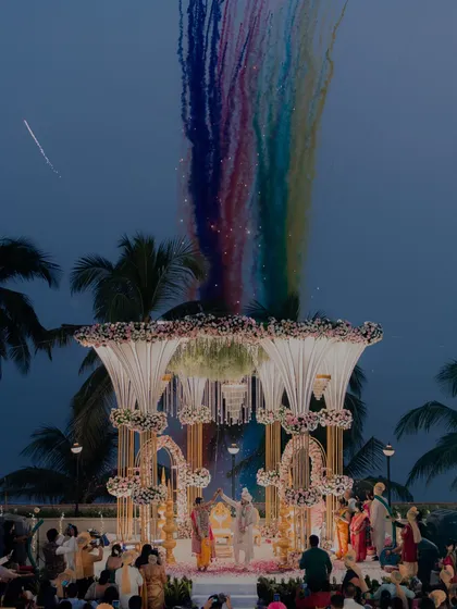 We specialize in capturing the grandeur of your wedding day. This shot from a Maharashtrian beach wedding shows how we frame the scale and beauty of your ceremony, creating an image that is both epic and personal.