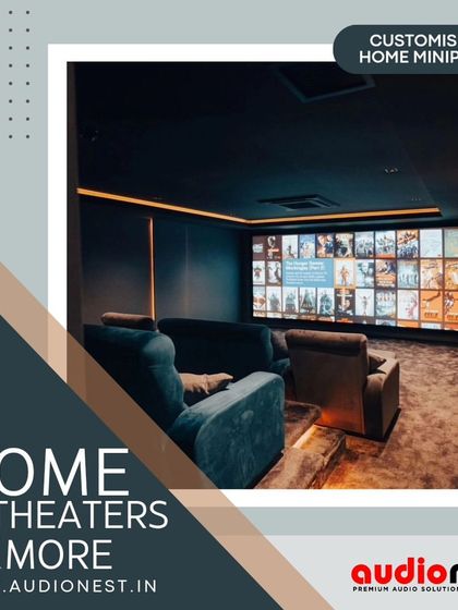 A view of a custom home miniplex we designed. This space is fully optimized for a cinematic experience, with a large screen, multi-channel audio, and controlled lighting to make you feel like you're at the movies.